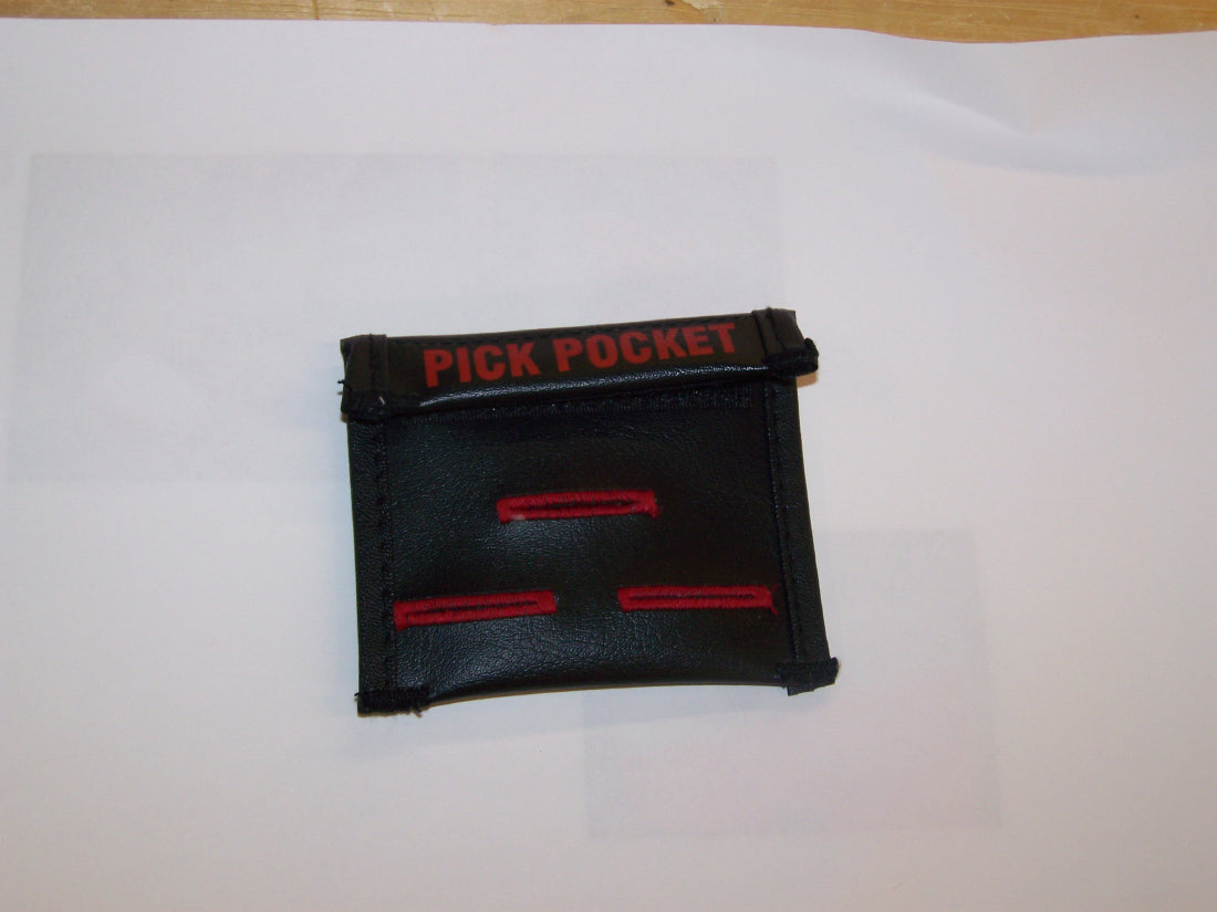 Black wallet with red text 'PICK POCKET' on a white background