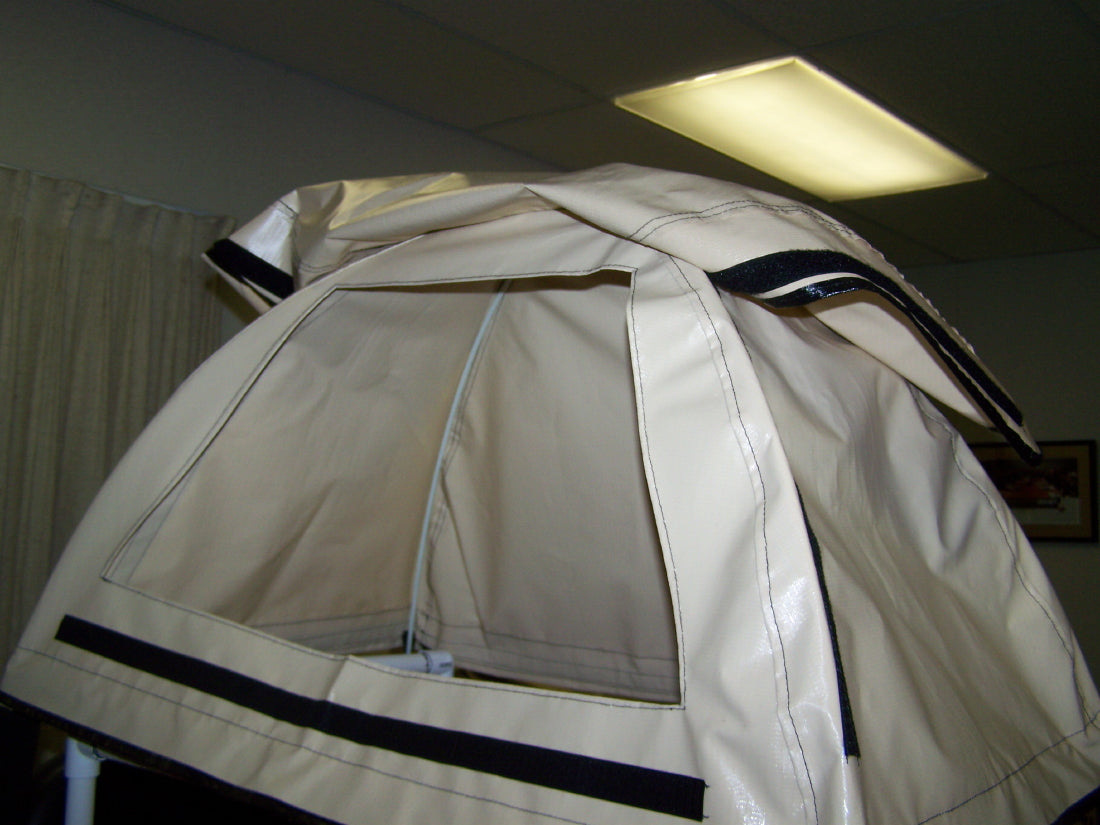 Beige tent with black accents